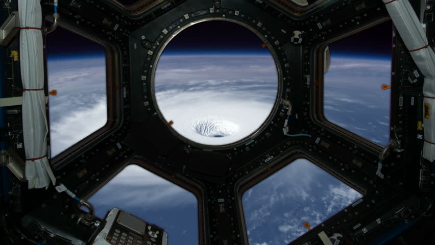 A large ominous hurricane rotating as seen from the International Space Station.