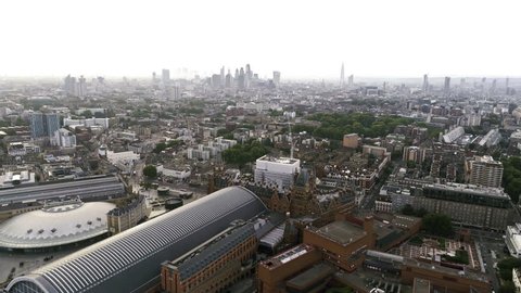 Aerial View Iconic Towers Skyscrapers and King's Cross St Pancras International Station around Euston in City Central Town of London England 4K