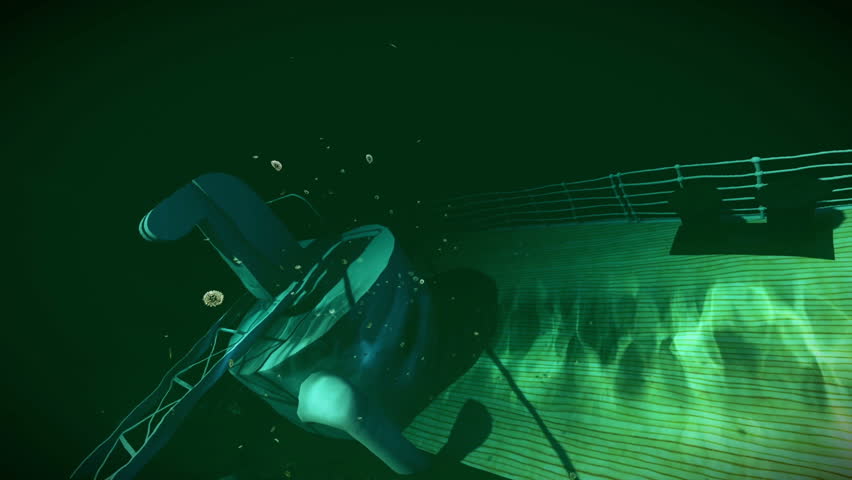 Camera under water filming a shipwreck