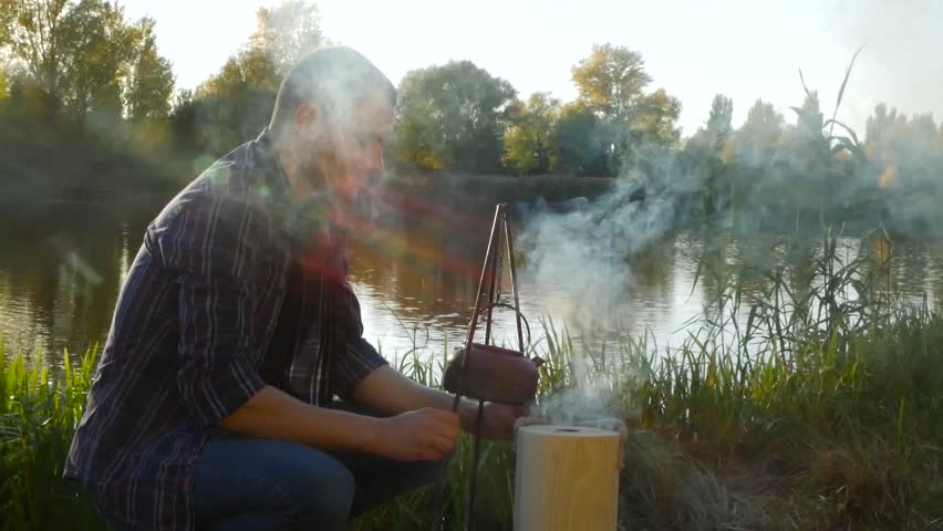 Making tea outdoor on the fire