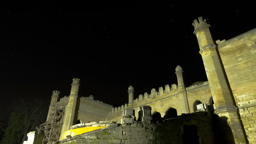 Star Trails Over Scenic Abandoned Ruin of Building. Time Lapse. 4K.
