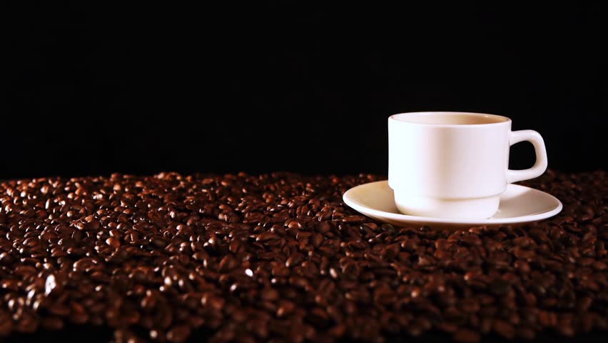 a cup of coffee in the dark