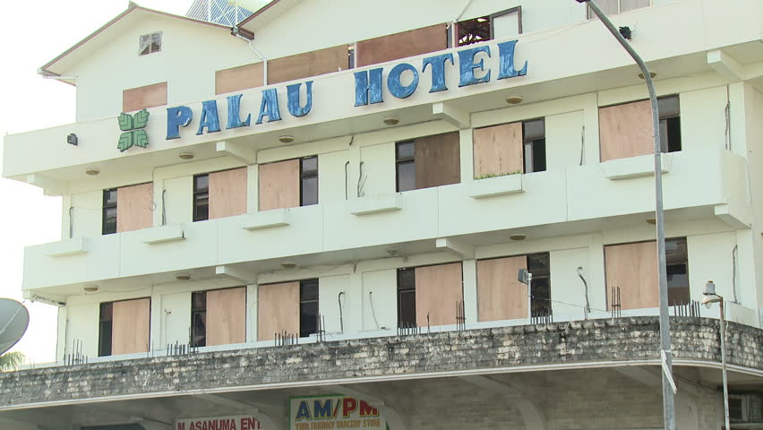 KOROR, PALAU - DECEMBER 2012: Windows of hotel boarded up in preparation for