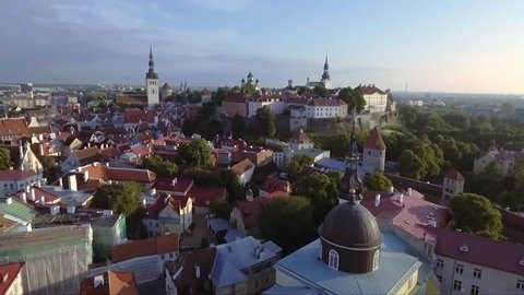 Aerial pan of medieval Tallinn old town and Toompea hill