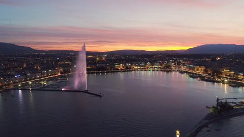 Aerial view of sunset at Geneva Water Fountain (Jet d'Eau) in Geneva Lake, Switzerland. 