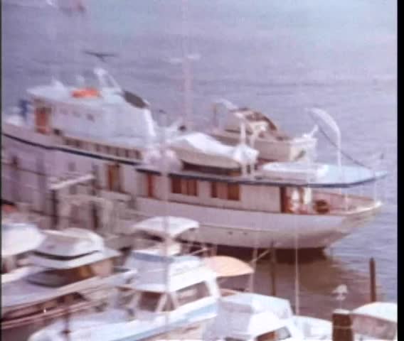 Nautical vessels moored in harbor