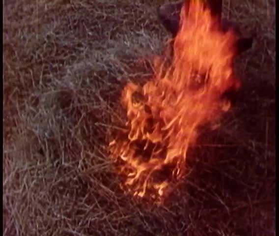 Close-up blazing hay stack