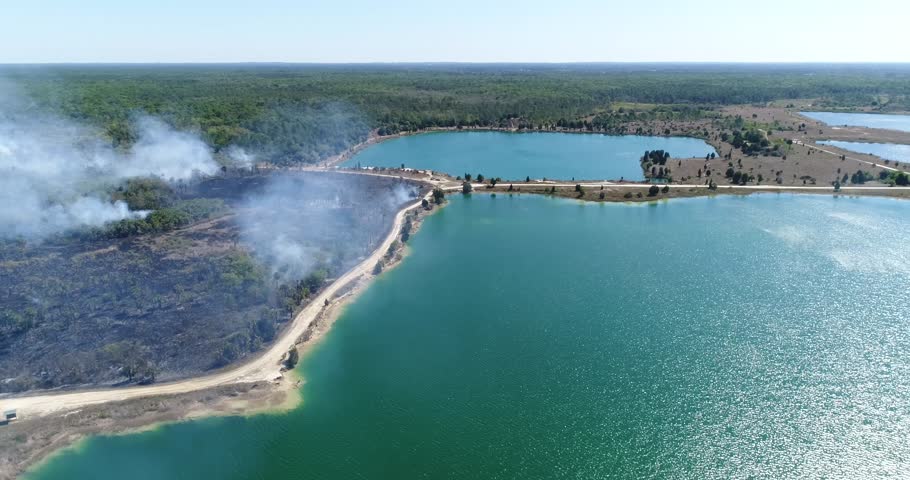 Wildfire Flames, forest fire Brush fire in Hernando Florida Drone Aerial view. Firefighters in Hernando, Pasco counties battling brush fires fueled by Florida