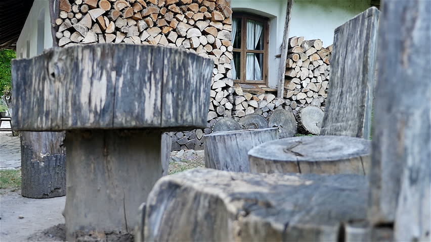 Old house with chopped woods in Bulgaria