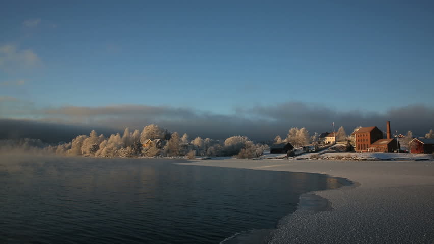 Frosty fjord in winter landscape