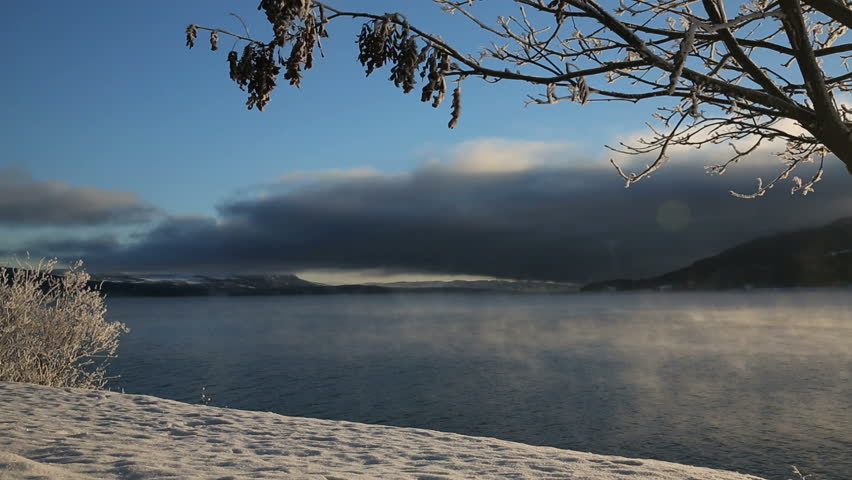 Frosty fjord in winter landscape