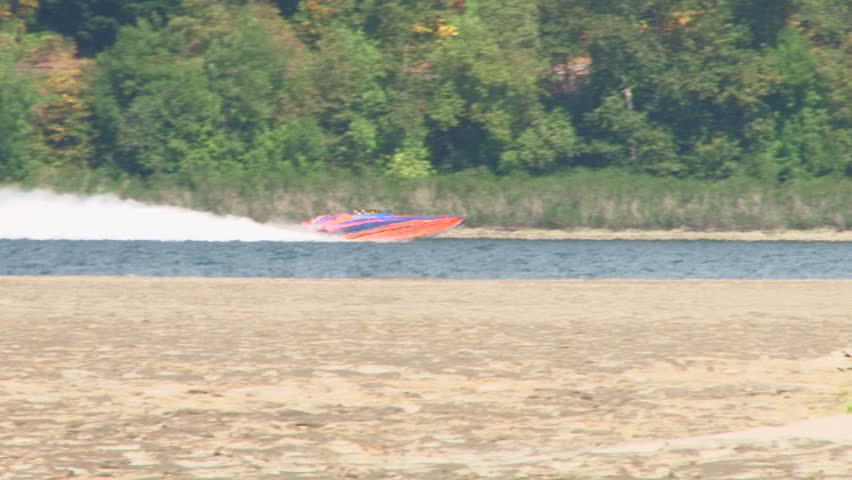 Race boat speeds by in the Columbia River Gorge in Oregon.