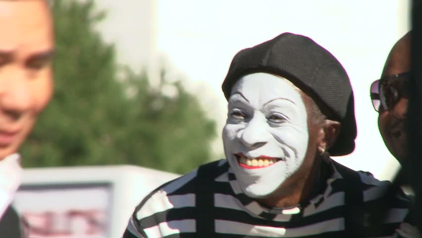 LAS VEGAS, NEVADA - CIRCA 2012: Street mime smiling and performing for tourists