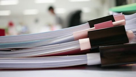 Paper stack, Pile of unfinished documents on office desk folders to business functions. Stack of business papers for Annual Report files, Document is written,drawn,presented. Business offices concept.