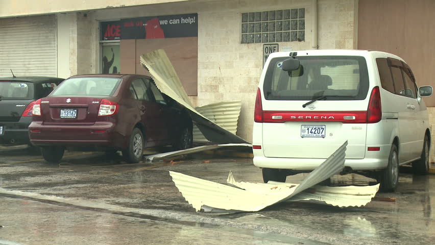 KOROR, PALAU - DECEMBER 2012: Debris strewn across parking lot after damaging