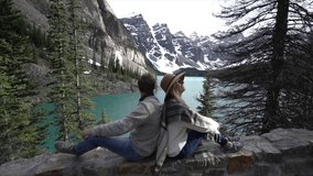 Slow motion video HD format- Young couple being affectionate by the lakeshore in Banff national park, Canada
People travel love sharing concept