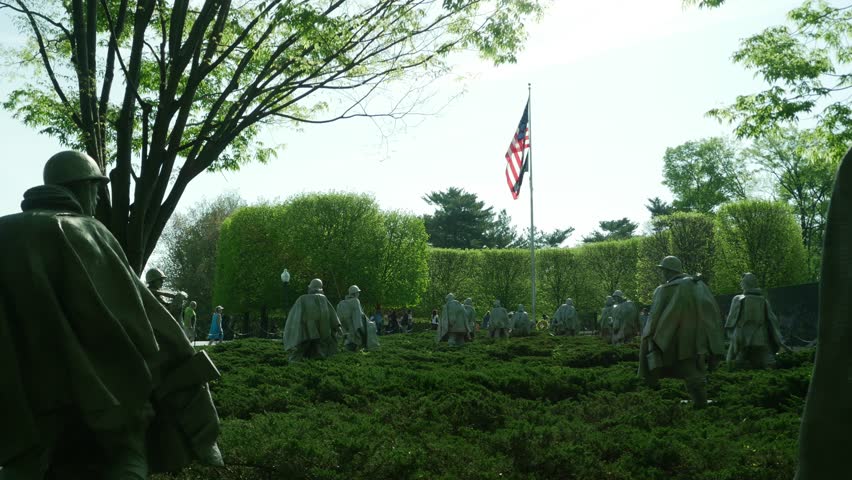 WASHINGTON DC, USA - APRIL 16, 2017 Washington DC, Tourists around Korean War Veterans Memorial