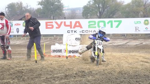 2017 year. 28 of October. Ukraine. The city of Bucha. Children and adults katogory sports competitions on motocross on motorcycles, Slow Motion Picture