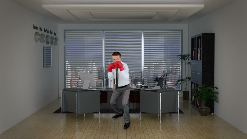 Businessman Boxing in Office Room