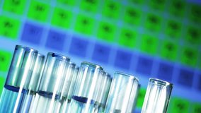 Glass test tubes and the hands of the researcher. The scientist makes an investigation of the interactions of substances and elements. Periodic table in the background. - Powered by Shutterstock - Get 15% off with code: PIKWIZARD15