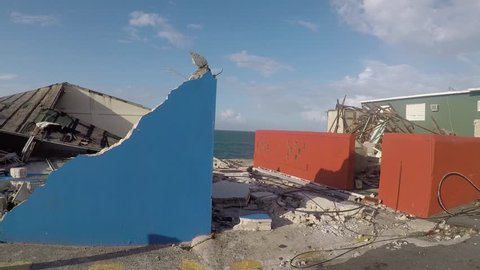 San Juan, Puerto Rico - October 03, 2017: Hurricane damage on Caribbean oceanfront houses in La Perla, Puerto Rico