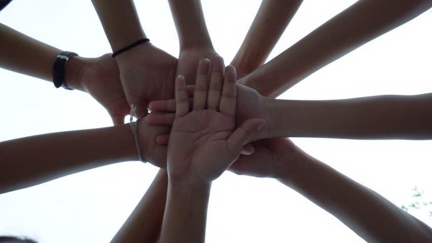 Hands holding together. A man of many hands.