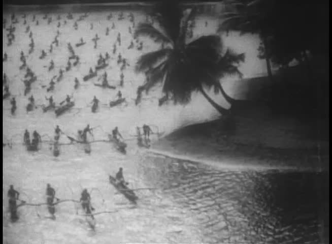 Montage natives in canoes landing on island