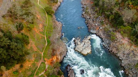 Aerial of American river near Foresthill, Auburn-Foresthill or Auburn road bridge crossing over the North Fork American River in Placer County and the Sierra Nevada foothills, in eastern California.