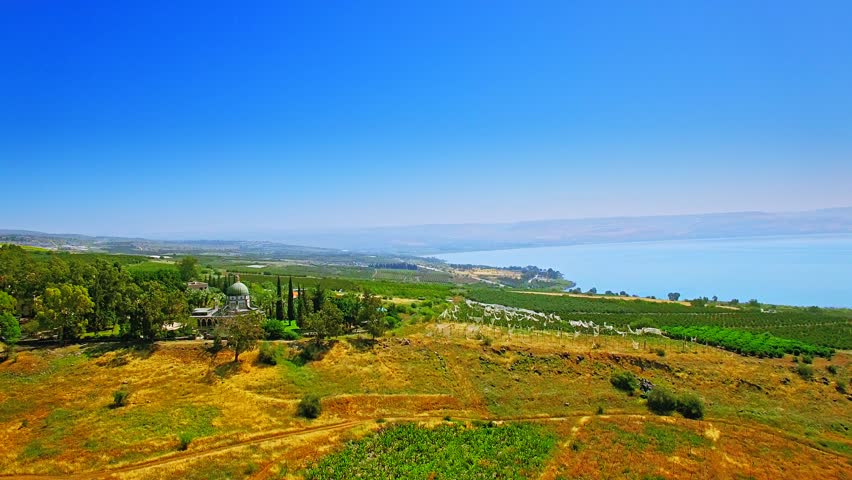 Historical agricultural valley with fields and vineyards by sea of Galilee in Israel, a popular tourist attraction and a pilgrimage site