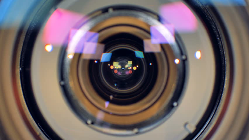 A macro view on a working video camera lens with inner rings seen inside.  Royalty-Free Stock Footage #32669836