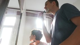 4K Father and son in the bathroom in the morning, little boy copies his father shaving. Slow motion. - Powered by Shutterstock - Get 15% off with code: PIKWIZARD15