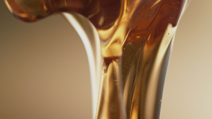 Thick honey dripping. Shot with high speed camera, phantom flex 4K. Slow Motion. Royalty-Free Stock Footage #32682568