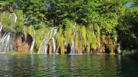 Picturesque morning view of Plitvice National Park. Colorful spring scene of green forest with pure water waterfall. Great countryside landscape of Croatia, Europe. Full HD video (High Definition).
