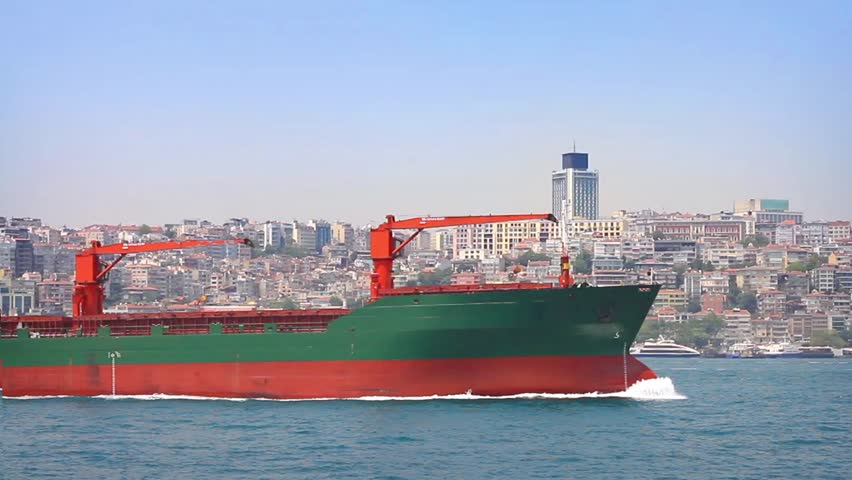 A bulk carrier ship sailing in front of Istanbul City. A 115 mt long, 17 mt