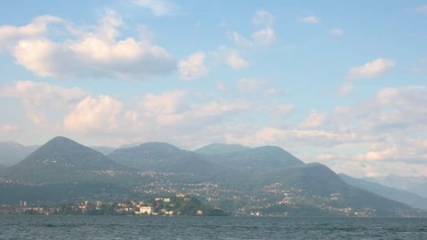 20.06.2016 - Stresa, Italy. Lake, mountains and tourist boat. Scenic view of Italian Alps.