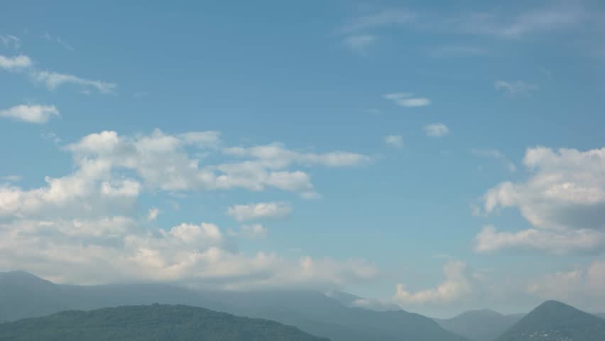 Maggiore lake, Stresa and Alps. Landscape of Italy, cloudy sky.