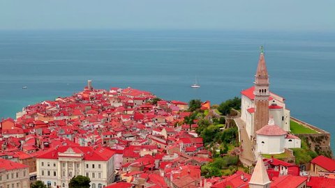 Aerial view of old town Piran. Colorful spring morning on Adriatic Sea. Beautiful cityscape of Slovenia, Europe. Magnificent Mediterranean landscape. Full HD video (High Definition).