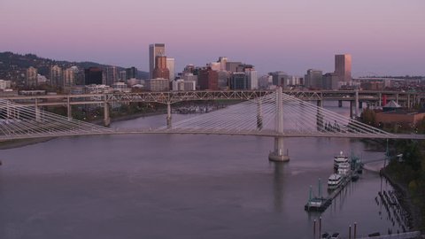 Portland, Oregon circa-2017, Flying over Tilikum crossing bridge towards city buildings. Shot with Cineflex and RED Epic-W Helium.