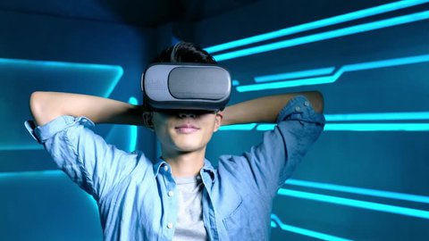 video of man wear vr and feel excited on the technology background
