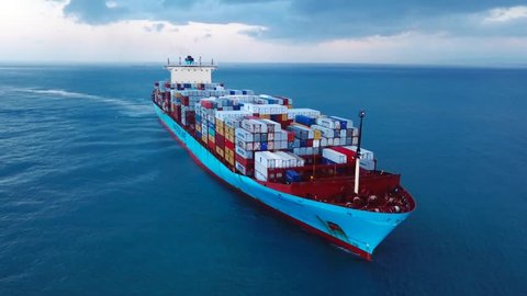 Mediterranean sea - November 2, 2017: Aerial footage of a large Maersk container ship sailing the Mediterranean sea in stormy weather.