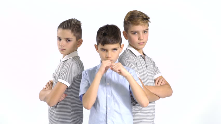 Three cool brothers at white background
