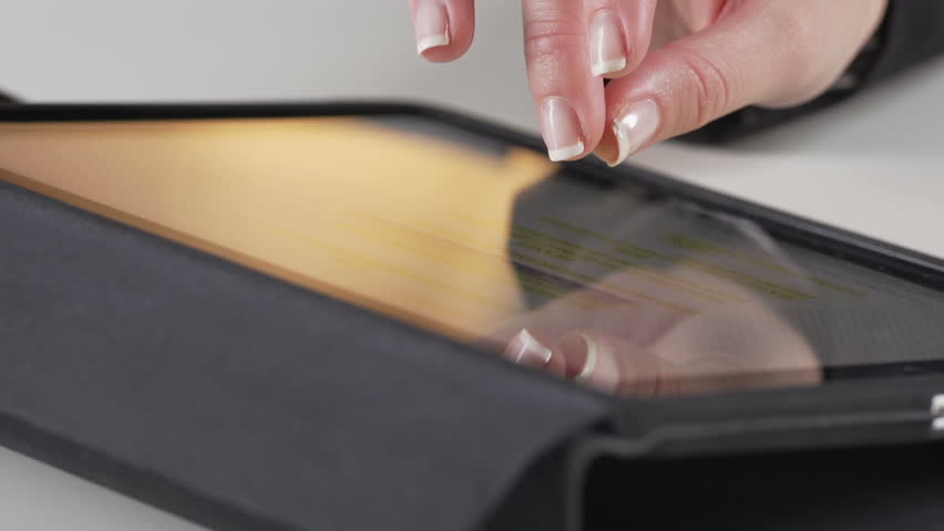 Close Up Shot Of Female Hand Using Digital Tablet