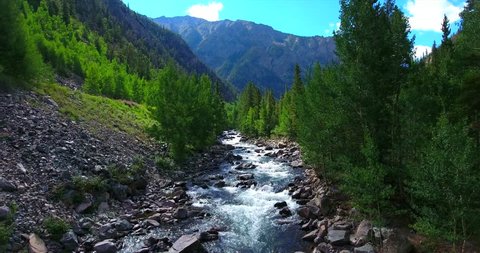 White-Water Creek Surrounded By Green Pines - Approaching Aerial View - Ten Mile Creek, Colorado, USA