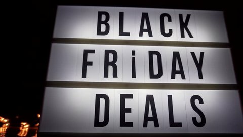 Black Friday Deals Cinematic Sign on Lightbox to Advertise Christmas Sales