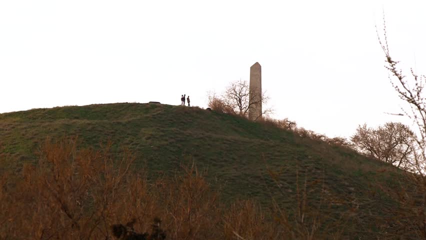 People at the monument of memory