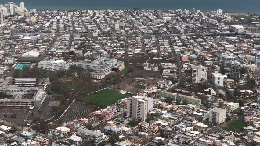 San Juan, Puerto Rico - October 03, 2017: View through plane window on the city Puerto Rico