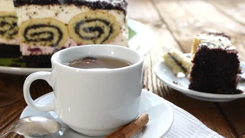To drink tea with a cake. 