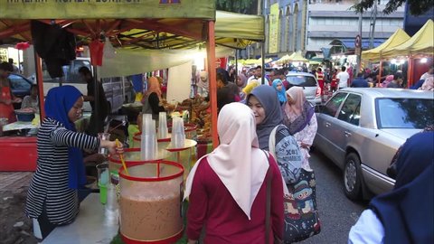 KUALA LUMPUR, MALAYSIA - NOVEMBER 11, 2017. Lot of Malaysian people visit Jalan Tunku Abdul Rahman night market in Kuala Lumpur.