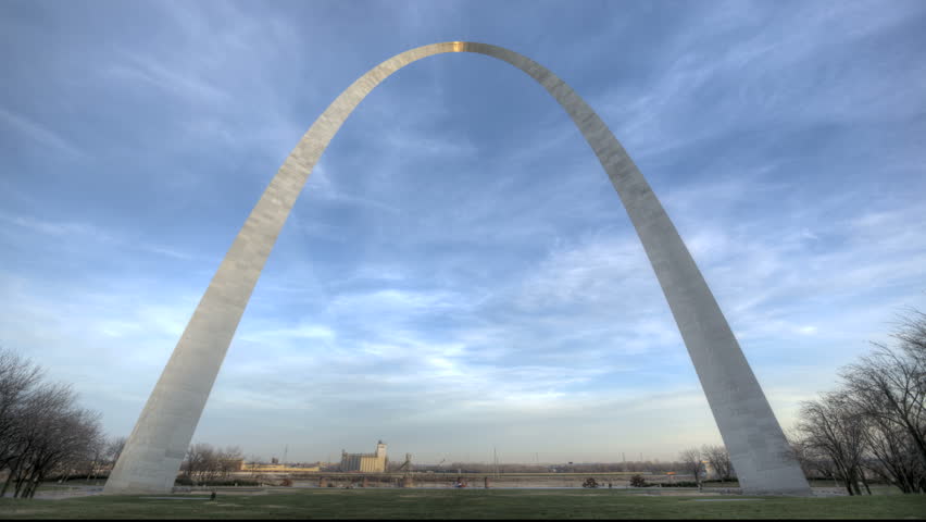 ST. LOUIS, MO - NOV 28: Timelapse St. Louis Arch with dramatic clouds and red