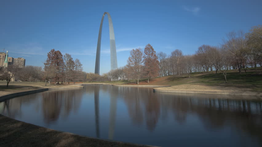 ST. LOUIS, MO - NOV 28: Timelapse St. Louis Arch with a lake and reflection in